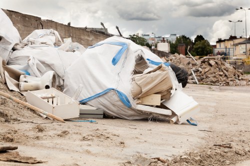 Business professionals managing waste removal in Woolwich office